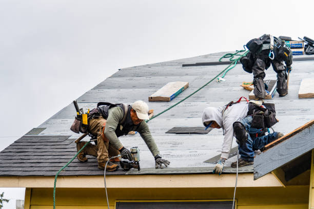 Professional Gutter Installation technician working in Arco, ID